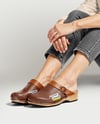 Pair of Clogs on Woman's Legs with Jeans Mockup
