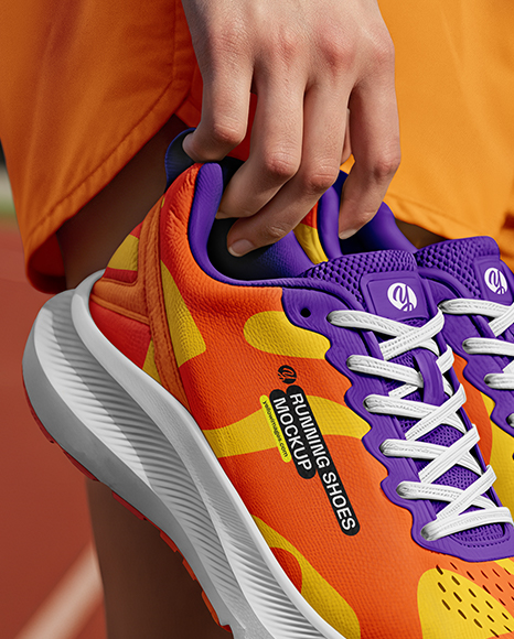 Pair of Running Shoes in Woman's Hand Mockup