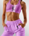 Woman Wearing Sports Bra and Sweatpants Mockup