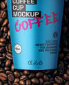 12oz Paper Cup on a Stack of Coffee Beans Mockup