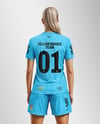 Woman Wearing Soccer V-Neck Jersey and Shorts Mockup