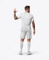 Soccer Player Wearing Jersey and Shorts Mockup