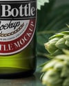 Beer Bottle Surrounded by Hops Branches Mockup