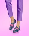Pair of Suede Loafers on Woman's Legs Mockup