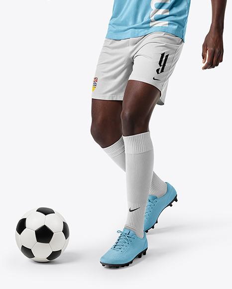 Soccer Player Wearing Raglan Jersey and Shorts Mockup
