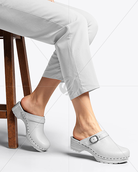 Pair of Clogs on Woman's Legs Sitting on Stool Mockup