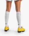 Female Soccer Player Wearing Jersey and Shorts Mockup