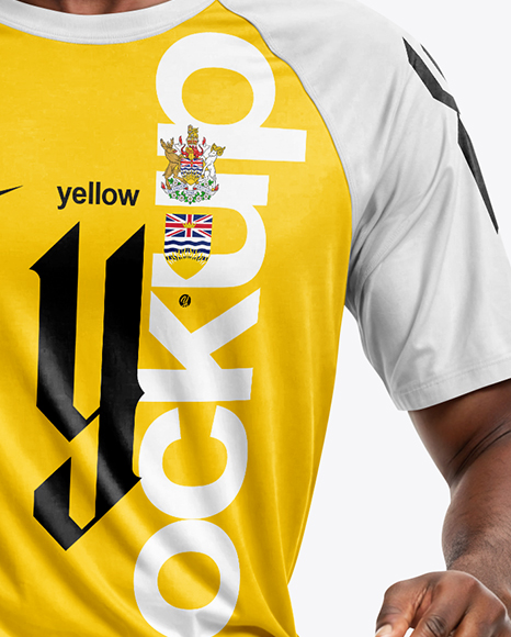 Soccer Player Wearing Raglan Jersey and Shorts Mockup