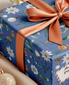 X-mas Gift Box with Bow and Decorations on Background Mockup