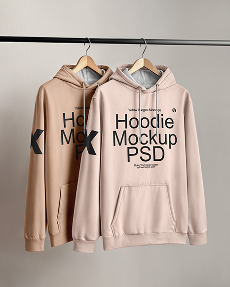 Two Hoodies on a Wooden Hanger Against a Plain Background Mockup