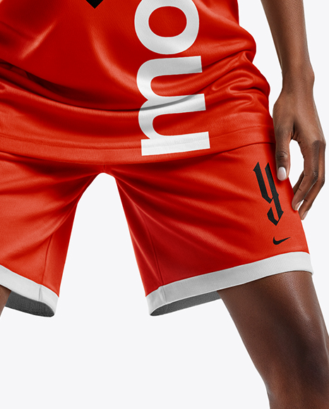 Female Basketball Player Wearing a V-Neck Jersey and Shorts Mockup