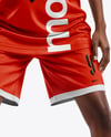 Female Basketball Player Wearing a V-Neck Jersey and Shorts Mockup