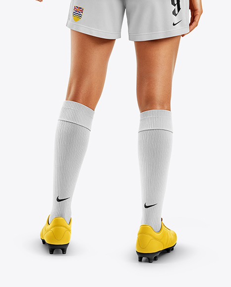 Female Soccer Player Wearing Jersey and Shorts Mockup