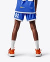 Female Basketball Player Wearing Jersey and Shorts Mockup