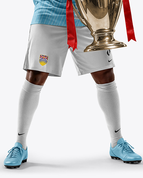 Soccer Player Wearing Jersey and Shorts Holds Cup Mockup