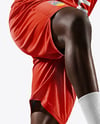 Basketball Player Wearing Jersey and Shorts Holding a Basketball Mockup