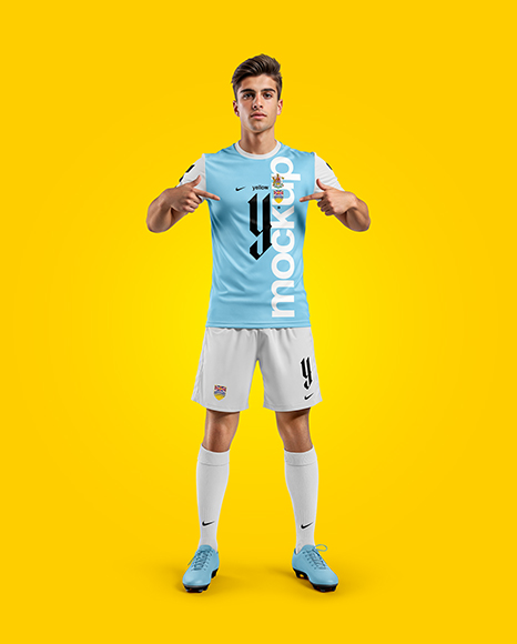 Man Wearing Soccer Jersey and Shorts Mockup