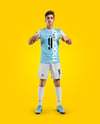 Man Wearing Soccer Jersey and Shorts Mockup