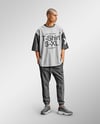 Man Wearing an Oversize T-shirt and Sweatpants Mockup