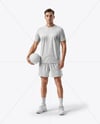 Man Wearing Full Volleyball Kit with Ball Mockup