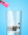 Matte Stick Sachet With Powder in a Hand & Water Glass Mockup
