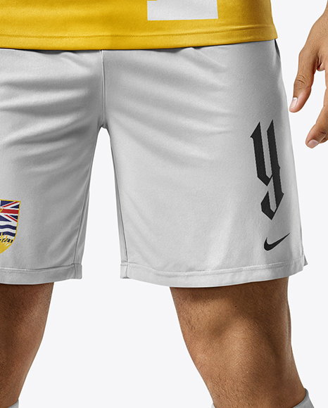 Soccer Player Wearing Jersey and Shorts Mockup