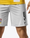 Soccer Player Wearing Jersey and Shorts Mockup