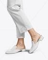 Pair of Suede Mules on Woman's Legs with Pants Mockup