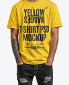 Young Man with Tattoo Wearing T-shirt and Ripped Jeans Mockup