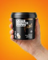 Matte Plastic Container in a Hand Mockup