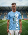 Soccer Player Wearing a Jersey and Shorts at the Stadium Mockup