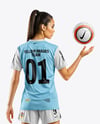 Female Soccer Player Wearing Jersey and Shorts Mockup