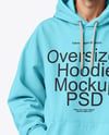 Young Man Wearing Oversize Hoodie and Pants Mockup