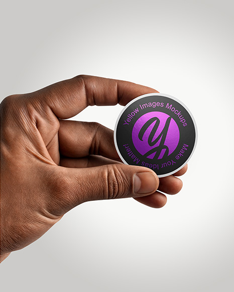 Round Sticker in a Hand Mockup