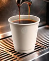 Paper Coffee Cup in Coffee Machine Mockup
