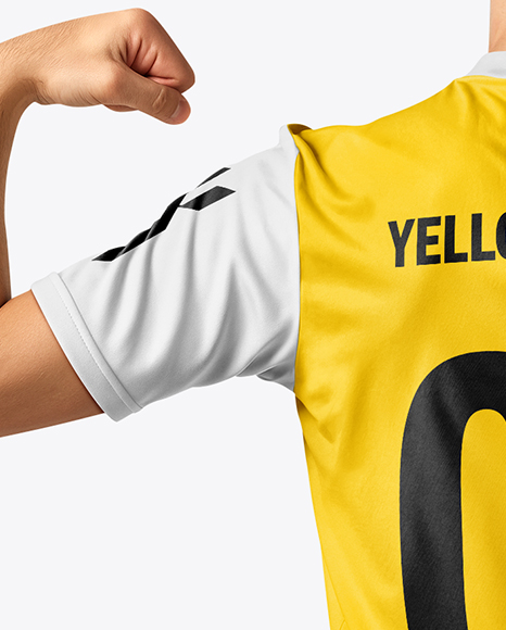 Man Wearing Soccer Jersey and Shorts Mockup
