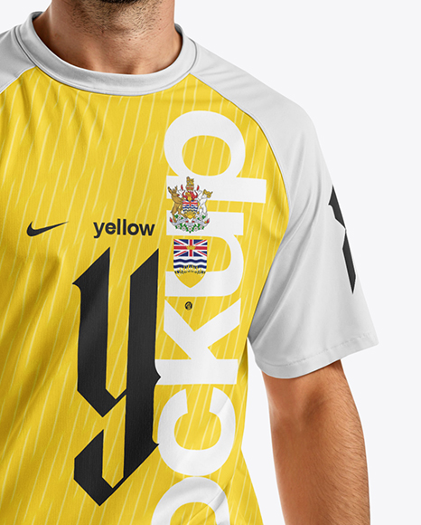 Soccer Player Wearing Raglan Jersey and Shorts Mockup