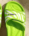 Slide Sandals Next to The Wall Mockup