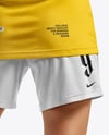 Female Soccer Player Wearing Jersey and Shorts Mockup