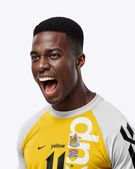 Soccer Player Wearing Raglan Jersey and Shorts Mockup