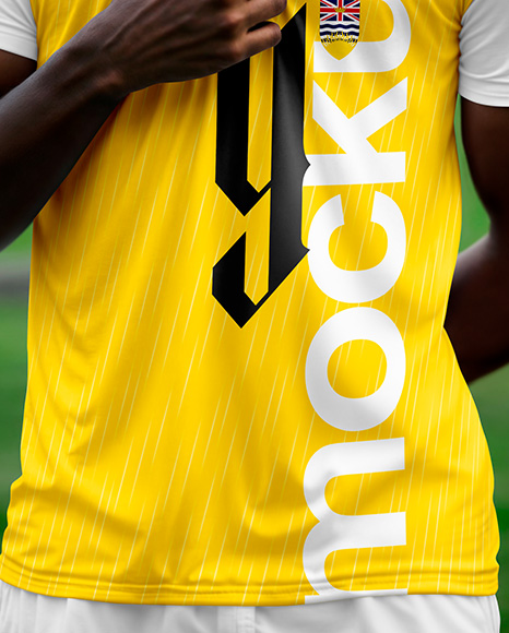 Soccer Player Wearing a Crew Neck Jersey and Shorts at the Stadium Mockup