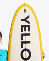 Woman Wearing Long Sleeve Rashguard and Bikini Bottom Holding Surfboard Mockup