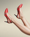 Pair of Slingbacks on Woman's Legs Mockup