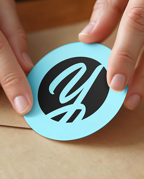 Round Sticker in a Hands Mockup