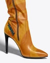 Pair of Over-The-Knee Boots on Women's Legs on Stool Mockup