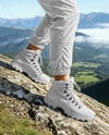 Pair of Hiking Boots on Woman's Legs Mockup