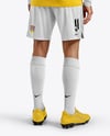 Man Wearing Long Sleeve Soccer Jersey and Shorts Mockup
