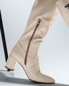 Pair of High-Knee Boots on Women's Legs with Jumper Dress Mockup