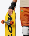 Skater in Protective Gear with Skateboard Mockup