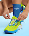 Running Shoes on Women's Legs Mockup